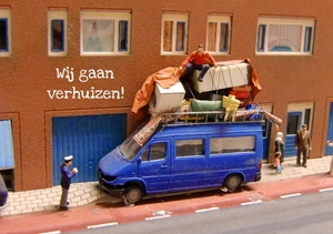 Verhuiskaart volgeladen bus